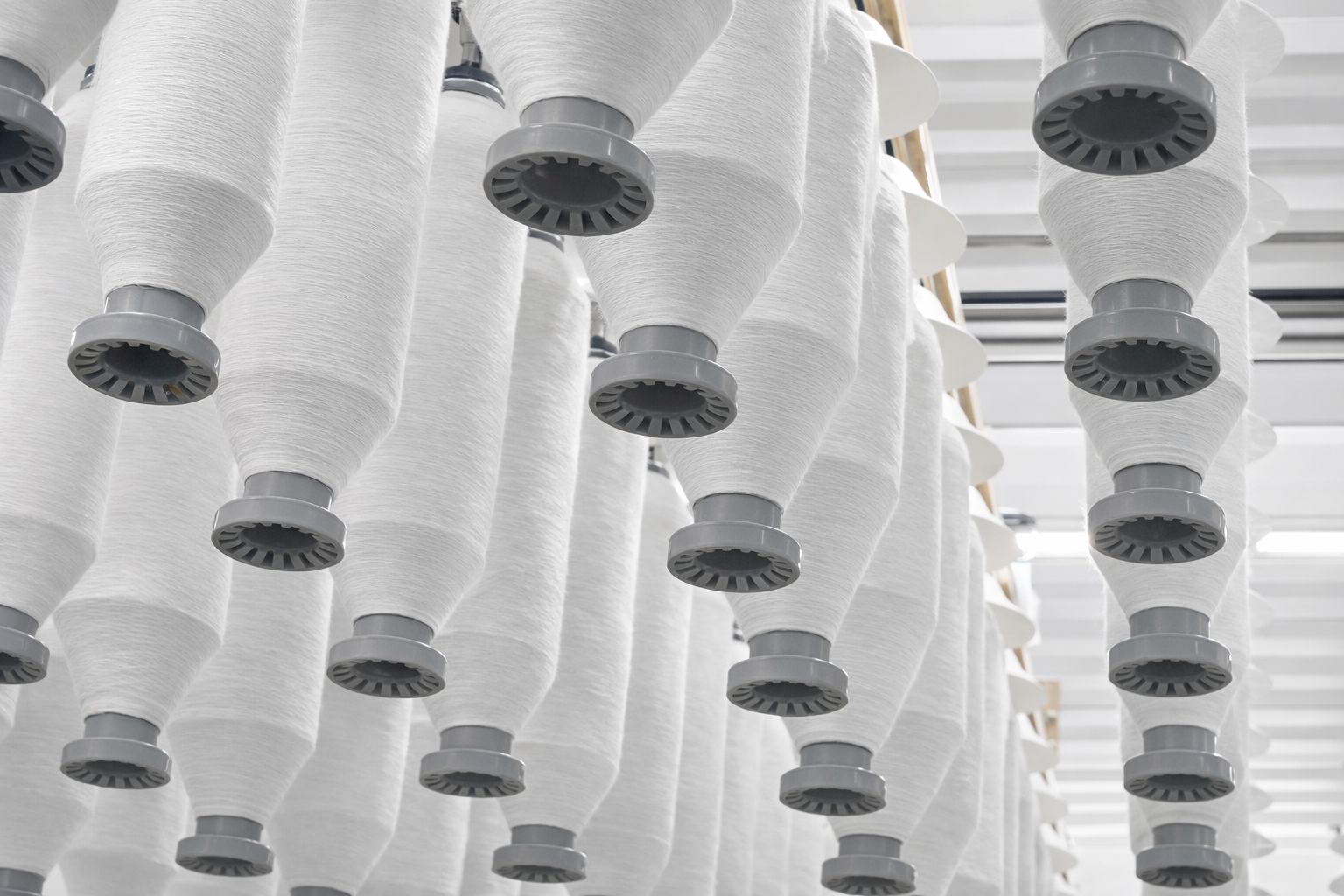 Suspended yarn bobbins in spinning mill